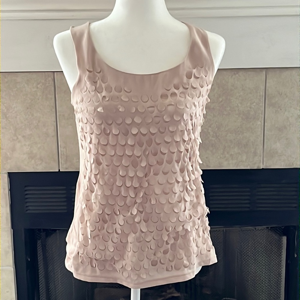 Perforated circles on beige silky top layer over soft cotton beige tank. Size S